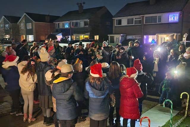 Pupils from nearby Whitefield Primary School sang carols at the switch on.  Photo: Rosemere Cancer Foundation