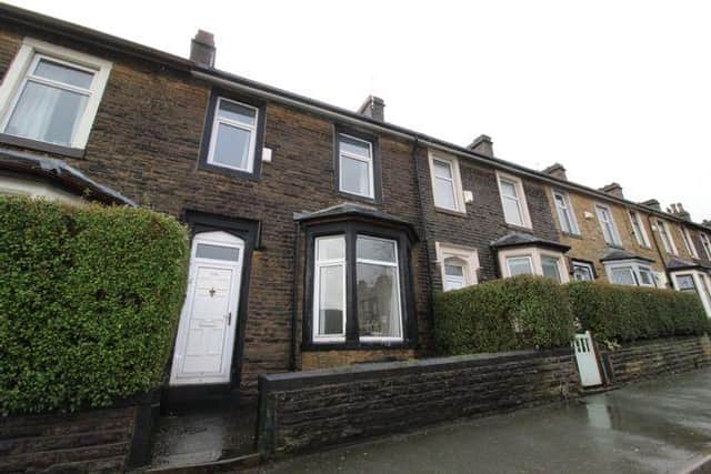 This spacious three-bedroom terrace home is on the market for offers in the region of £125,000 with Strike.