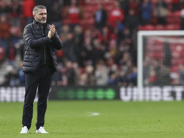 Preston North End manager Ryan Lowe claps the fans at the end of the match at Middlesbrough
