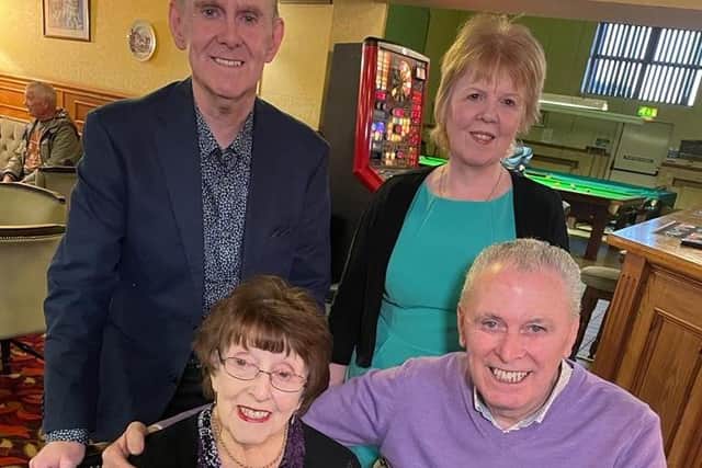The most recent photograph taken of Margaret includes (from front) Margaret pictured with Martin Logan from Sky TV’s The Irish in the UK and (back row) son Adrian and daughter Linda