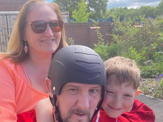 Zak with his parents Carol and Stephen