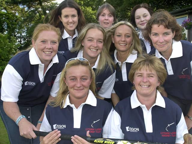 Lytham Ladies Hockey Club were set to pose nude for a fundraising calendar following their promotion. The girls practice a pose - 'We'll have to hold the hockey stick like this'