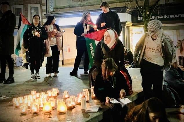 A candlelit vigil in Market Square in Lancaster to remember all those killed in the Israeli-Palestine conflict.