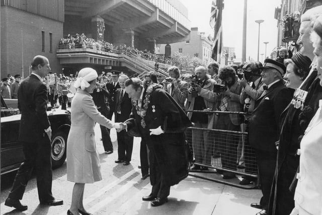 Greeting the Mayor on arrival in Preston, as the crowds line the balcony at the Guild Hall in 1977