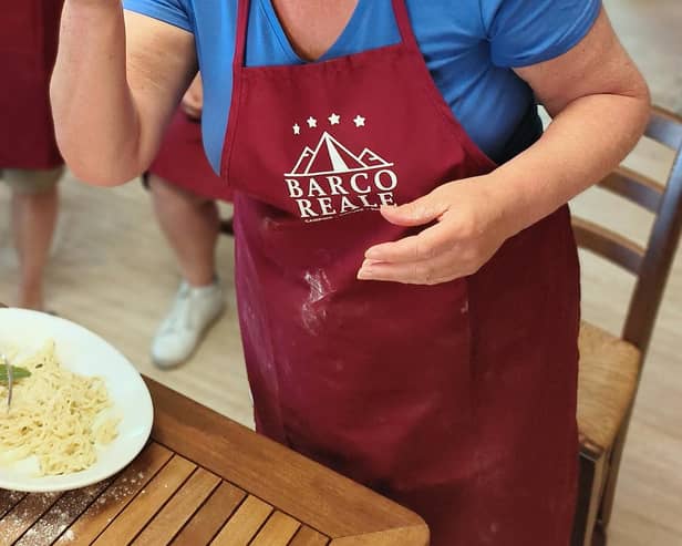 Karen enjoying the pasta she made after the cookery demonstration