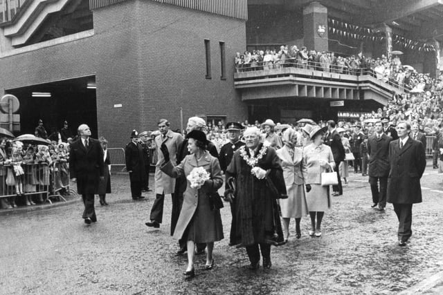 Making her way to the Town Hall after her arrival and greeting by the Mayor of Preston, during her visit in 1979