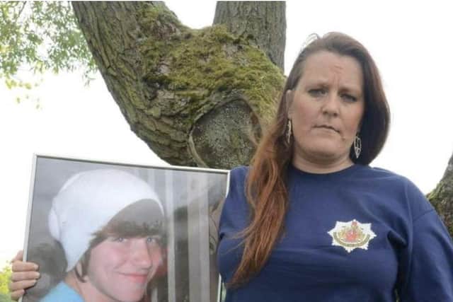 Rebecca Ramsay with a picture of her late son Dylan