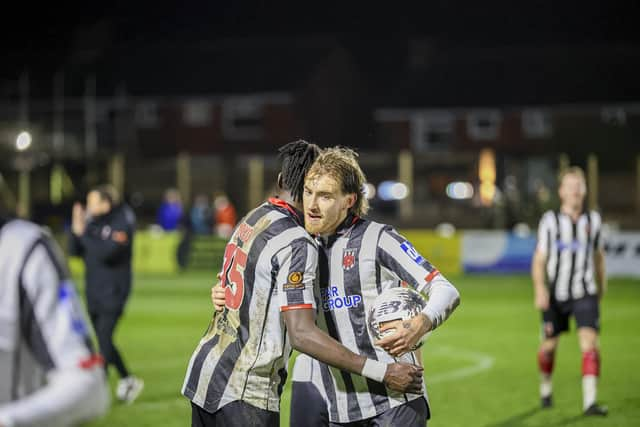 Billy Whitehouse claims the match ball after scoring a hat-trick against Darlington (photo and back page picture: David Airey/@dia_images)