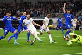 MADRID, SPAIN - APRIL 09: Karim Benzema of Real Madrid CF 
scores a goal which was later disallowed due to off side during the La Liga Santander match between Real Madrid CF and Getafe CF at Estadio Santiago Bernabeu on April 09, 2022 in Madrid, Spain. (Photo by Denis Doyle/Getty Images)