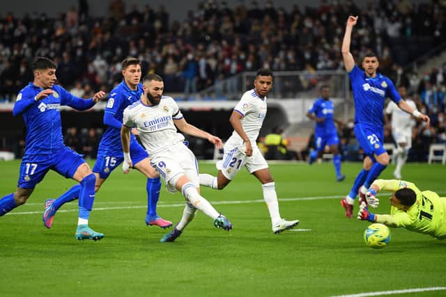 MADRID, SPAIN - APRIL 09: Karim Benzema of Real Madrid CF 
scores a goal which was later disallowed due to off side during the La Liga Santander match between Real Madrid CF and Getafe CF at Estadio Santiago Bernabeu on April 09, 2022 in Madrid, Spain. (Photo by Denis Doyle/Getty Images)