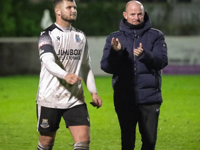 Brig boss Jamie Milligan with defender McCauley Wilson (photo: Ruth Hornby)