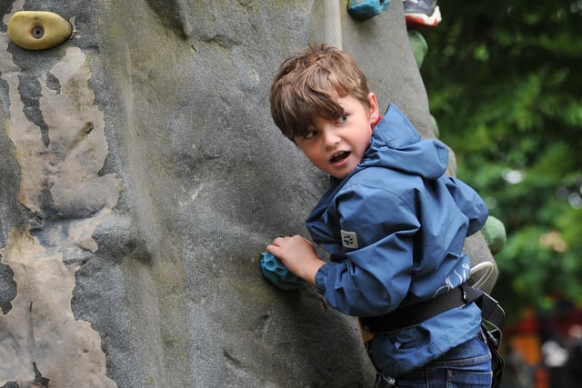 Jagger Pickering, six, has fun on the climbing wall