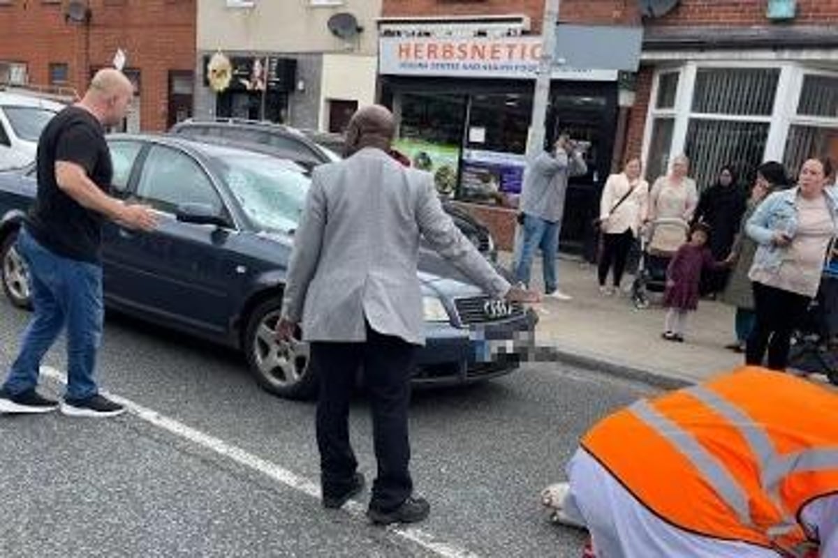 These were the scenes at the A59 New Hall Lane in Preston after a woman was hit by a car