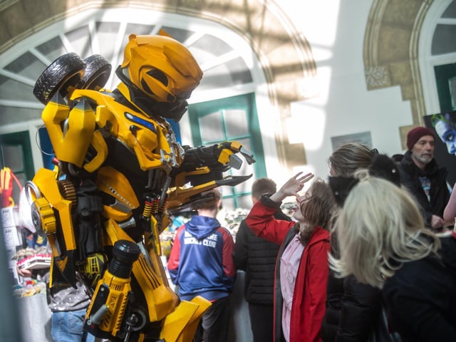A transformer meets some of the crowd.