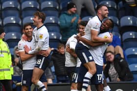Preston North End's Ched Evans is congratulated on scoring his team’s second goal
