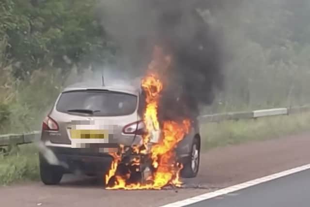 A car burst into flames on the M6 northbound near Preston (Credit: Megan Callaghan)
