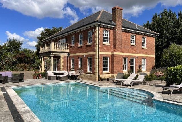 Slightly further afield, but who could resist this show-stopping pool?
The outdoor spa-like scenery and five-bed house with two driveways is the cheapest of our lot today at £995,000.