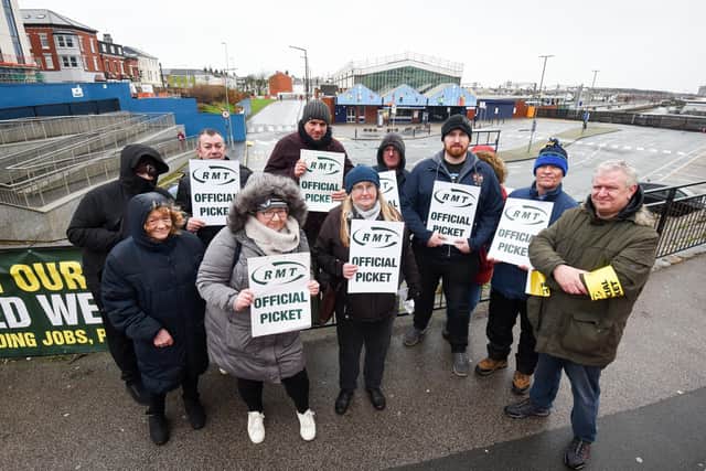 Members of the RMT union on strike outside Blackpool North Railway Station