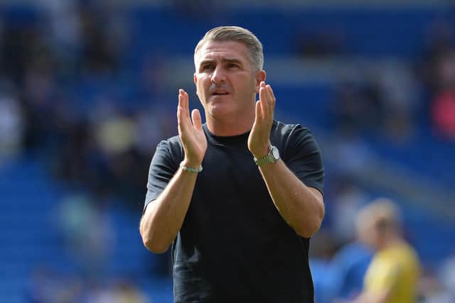 Preston North End manager Ryan Lowe applauds the fans at the final whistle after Cardiff.