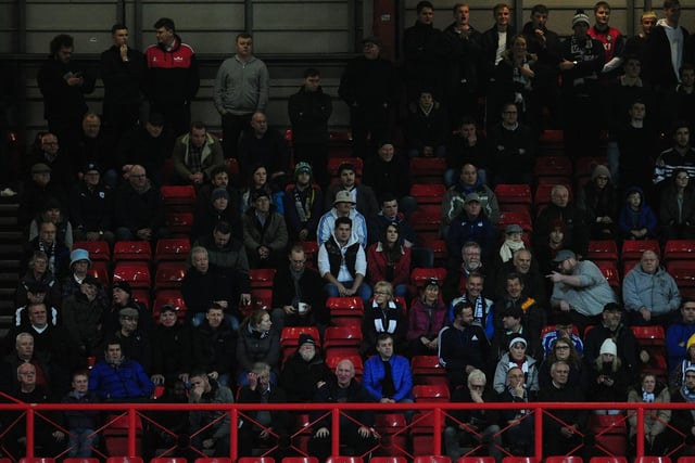 Preston North End fans watch their team in action at Bristol City.
