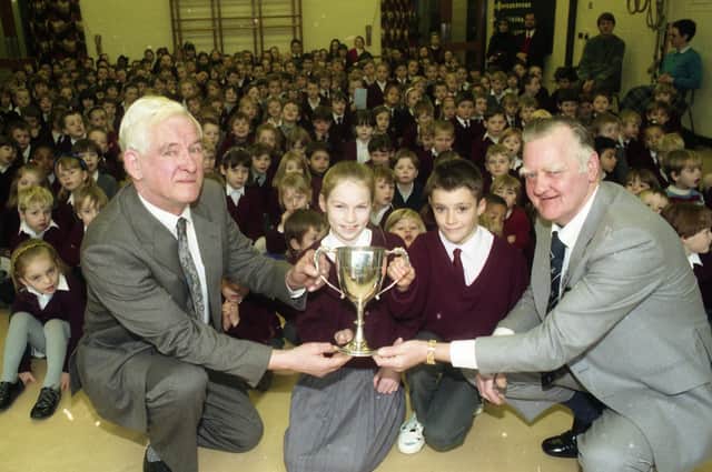 Children from Ingol Pool House School, Preston, have won a top trophy for safe cyclists. The school, on Kidsgrove, Tanterton, Ingol, was awarded the Jack Heatley cycling trophy for the best overall results in 1991. Pictured above: Left to right, Coun Jack Heatley, Lindsay Craig, Glen Hillage and Mr Ken Chapman
