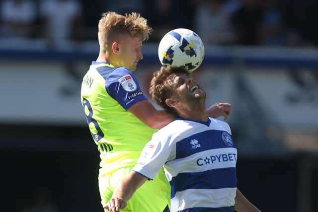 North End's Ali McCann and QPR's Nicolas Madsen (CameraSport)
