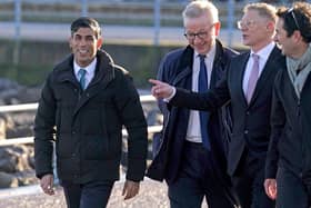 Prime Minister Rishi Sunak (left) and Minister for Levelling Up, Housing and Communities, Michael Gove (second left), with Morecambe MP David Morris, during a community visit to the Eden Project Morecambe site on Morecambe promenade today (January 19). Picture: Owen Humphreys/PA Wire