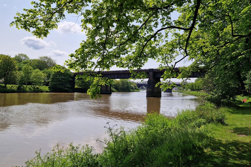 A bridge passes over the River Ribble next to Avenham Park