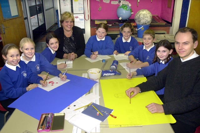 Headteacher Susan Fielden and deputy David Merritt with pupils at Torrisholme School