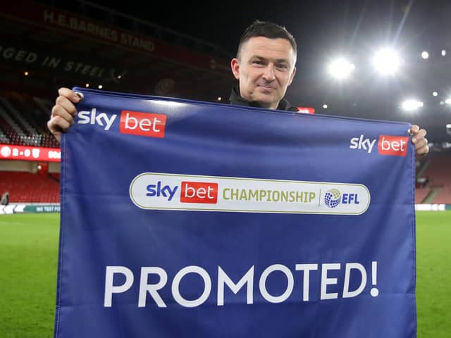 Paul Heckingbottom poses for a photo after winning promotion to the Premier League
