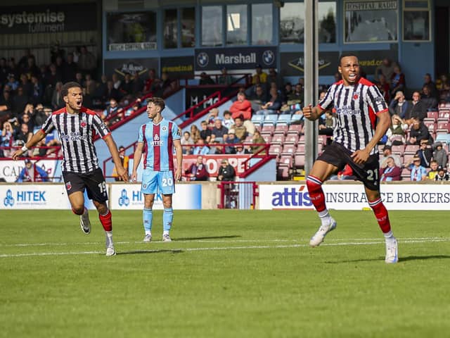 Kole Hall celebrates his late equaliser at Scunthorpe United (photo: David Airey/ dia_images)