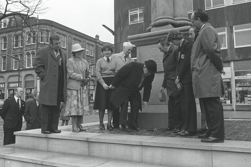 A time capsule gets buried at the foot of the obelisk, Preston flag market, 1979