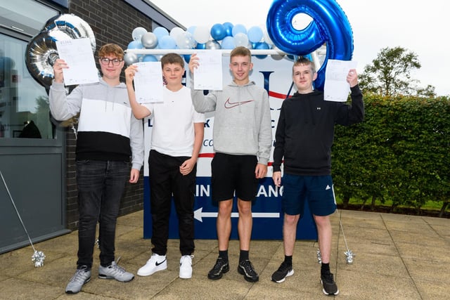 (L-R) Adam Robins, James Everleigh,  Harry Slater and George Olah celebrating top grades at Lostock Hall Academy.