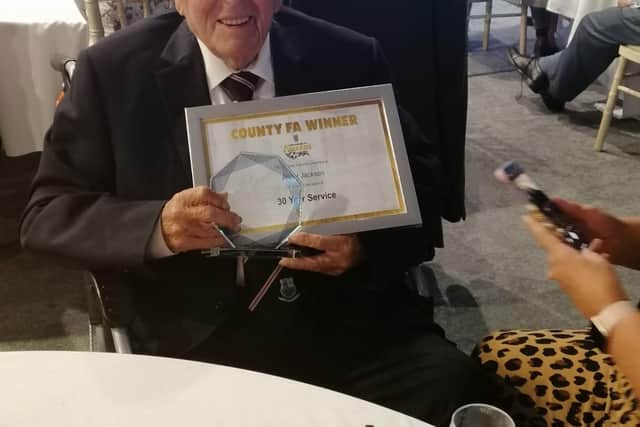 Arthur Jackson with his long service award