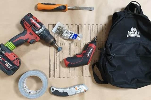 Two men have been arrested and a large amount of cash and power tools seized following thefts from cash machines in Chorley and Preston (Credit: Lancashire Police)