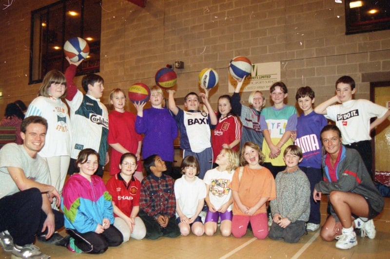 Sports-mad youngsters who took part in the After School Sports Club at West View Leisure Centre, Preston, seen with leisure centre assistant Dominic Robinson and volunteer Juliet Gravell