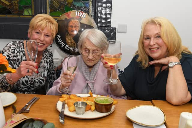 Jean Garstang celebrates  turning 108 with her daughters Christine and Pam