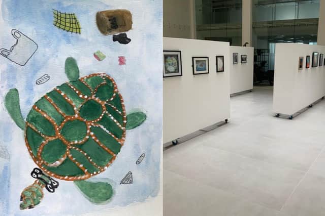 Left: 'Save the planet 20' by Lancashire's Nathan of St Matthew's CE Primary School. Right: the work displayed on the ground floor of the Royal Liver Building.