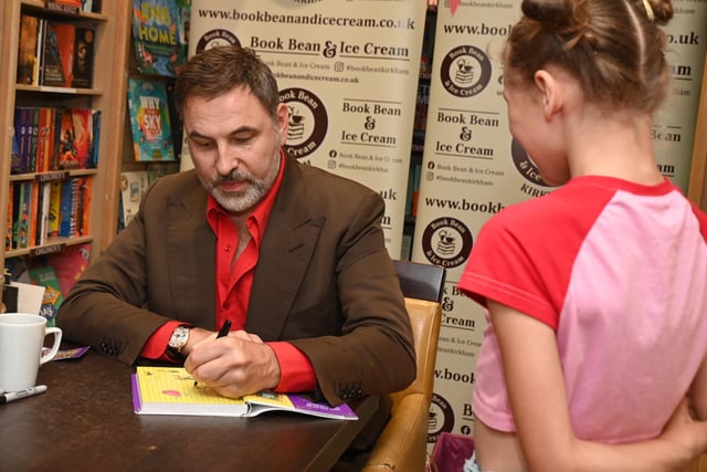 LANCASHIRE POST - BLACKPOOL - 15-07-23  Celebrity, comedian and children's author David Walliams promotes his new book, The World's Worst Monsters, at Book Bean and Ice Cream, Kirkham, where he met excited fans and their parents, signed booked and posed for photographs.