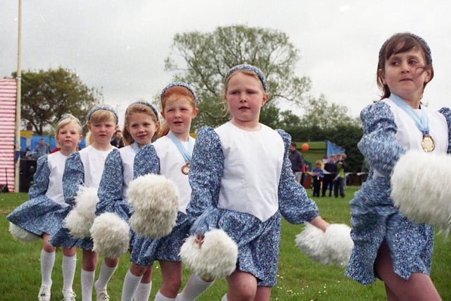 Hundreds of people enjoyed the Bank Holiday at a traditional Lancashire fair, as hundreds of families rolled up to Hutton Village Fete. Pictured are the Longton St Andrews Junior Morris Dancers who performed for the crowds