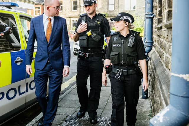 Lancashire Police and Crime Commissioner Andrew Snowden with officers.