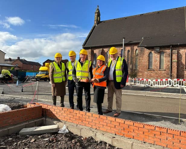 VIP guests at the site of a Wigan church being redeveloped into affordable homes. Photo: Housing People, Building Communities