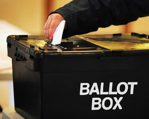 A voter placing a ballot paper in the ballot box. PIC: Rui Vieira/PA Wire
