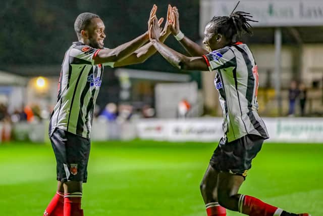 Chorley's David Moyo, right, and Carlton Ubaezonu celebrate the FA Cup win over Runcorn Linnets (photo: David Airey/@dia_images)