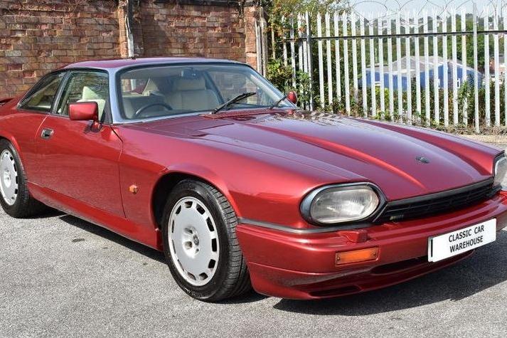 This 1993 Jaguar XJR-S 6. 0 V12 Coupe Automatic is a rare car.
Having the XJR-S was a limited edition model produced by Jaguar Racing featuring an enhanced version of the superb Jaguar V12, increased to 6. 0 litres and producing 333bhp.
This one has covered 79,000 miles and has an "excellent history" according to seller, Classic Car Warehouse in Blackburn.
The car has covered 79, 000 miles with an excellent service history, the service book detailing prior maintenance at 4276, 11797, 18072, 27055, 34986, 43867, 47740, 53396, 69780, 75938, 77729, 78809 and 79700 miles. The car has been maintained with no regard to expense with £3900 being spent at the last service ! Together with the stamped service book we have an A4 binder containing invoices for work carried out, old MOT's etc.
Finished in stunning flamenco red with cream leather sports upholstery.