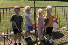 Pupils of Ormskirk Church of England Primary School after the planting of the tree.*