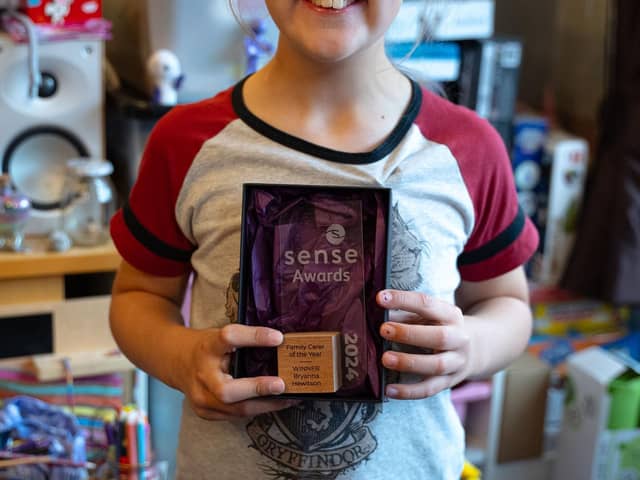 Bryanna with her Sense Award