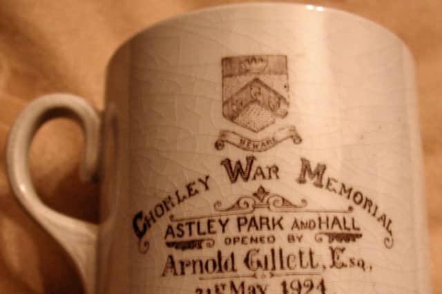 A commemorative mug to mark the Astley Park and hall opening day on May 31st 1924