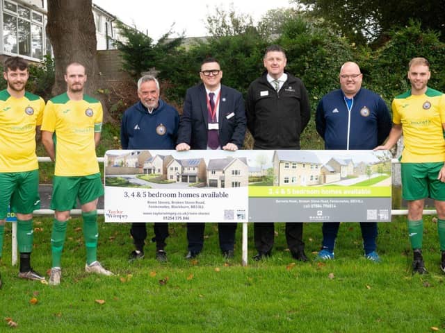 Feniscowles and Pleasington FC and representatives from Taylor Wimpey and Barratt Homes