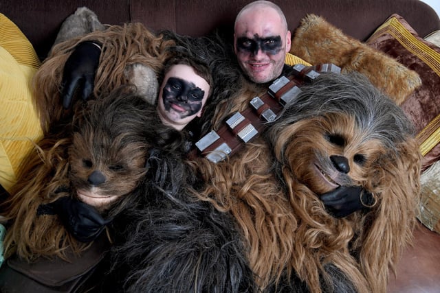 Behind the masks David Leigh and his son Tyler, members of the 99th Garrison.